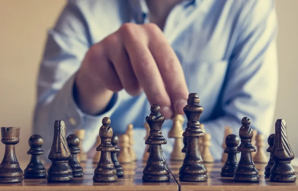 A Man Playing Chess
