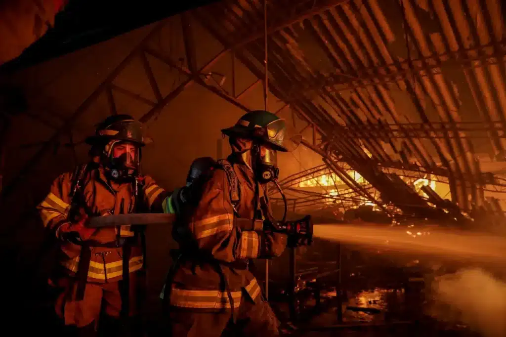 Two Firefighters Putting Out the fire