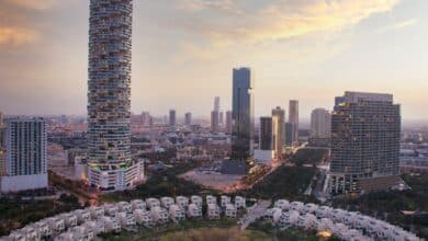 an aerial view of a city with tall buildings