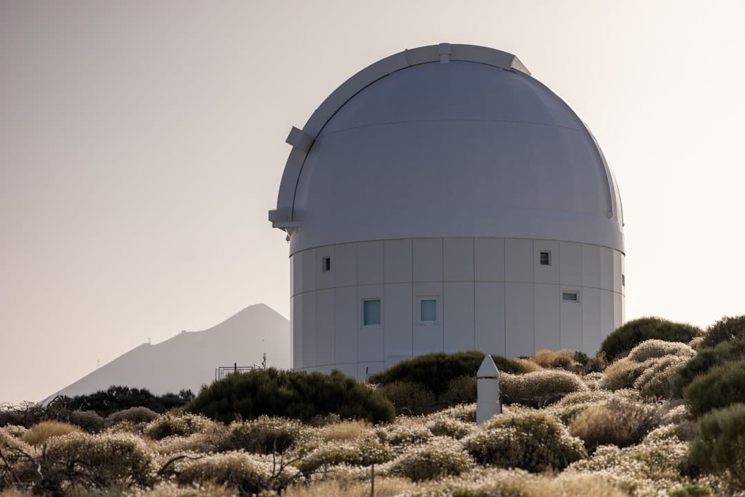 a white building in a desert